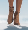 brown cowboy boots  Ocean