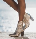 Gold heeled ankle boots