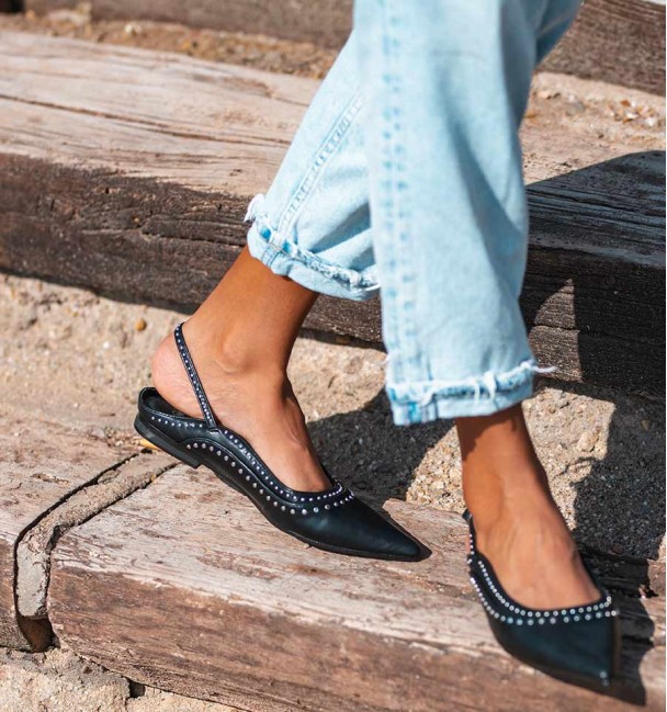 Flat shoe attached to the heel with...