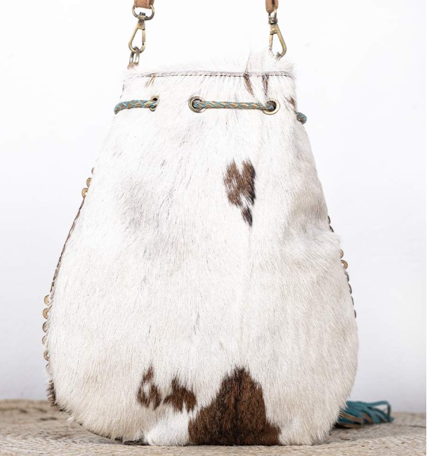 Bohemian bag with pockets, fringes, shells and beads. Pony skin and leather.