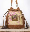 Pistachio colt leather bag with front pocket and green colt leather with lilac dots. Bronze piece and stone in the centre