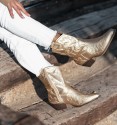 Women's gold cowboy boots, mid-calf and medium heel. Vegan