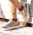 women's gold leather running trainers with high soles and combined colours. Animal free