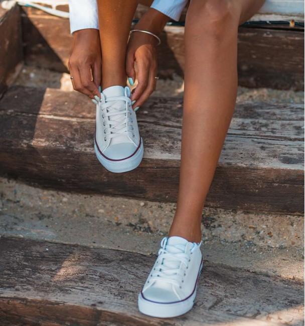 White leather trainers with rubber toe cap
