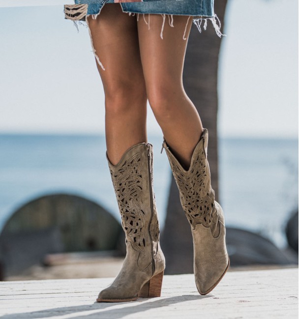 khaki green cowboy boots with punched high shaft and wooden heel. Animal free khaki green cowboy boots with punched high shaft and wooden heel. Animal free