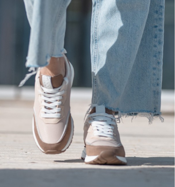 running trainers in beige, silver and white. Animal free