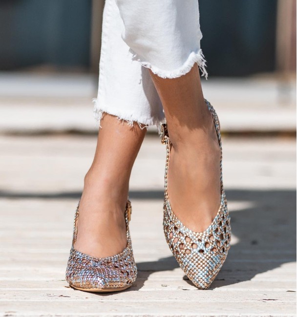 Champagne ankle strap shoes with wide heel and buckle at the ankle. Braided instep