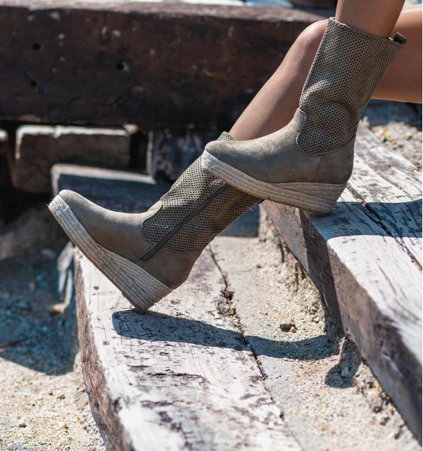 Khaki coloured textile boots with esparto grass wedge sole.