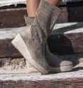 Khaki coloured textile boots with esparto grass wedge sole.