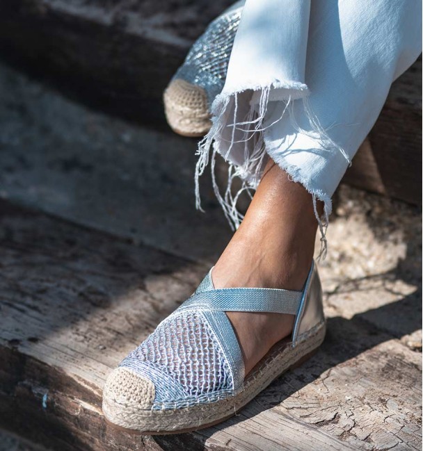 silver espadrilles with crossed elastic straps on the instep and original woven toe cap. Animal free silver espadrilles with crossed elastic straps on the instep and original woven toe cap. Animal free
