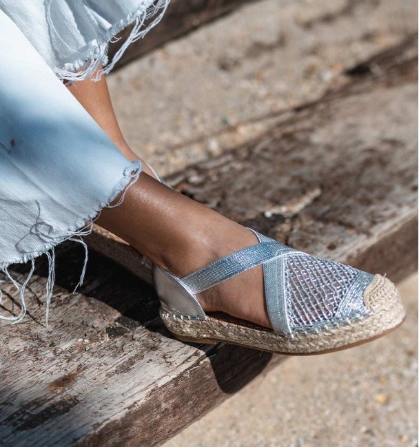 silver espadrilles with crossed elastic straps on the instep and original woven toe cap. Animal free silver espadrilles with crossed elastic straps on the instep and original woven toe cap. Animal free
