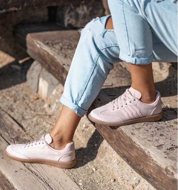 pink textile trainers with brown rubber sole and stripes. Animal free.