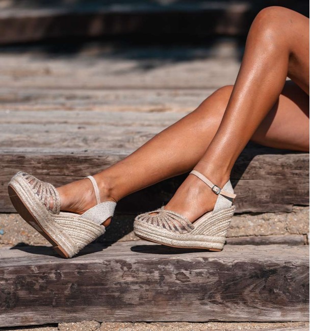 Esparto wedges with esparto braiding on the instep. Textile material and esparto sole.