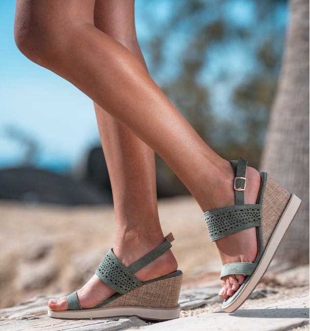Sandals with lined wedge and green upper. Animal free Sandals with lined wedge and green upper. Animal free