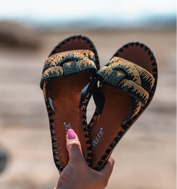 flat sandals  in orange and black beads cross straps. Vegan flats flat sandals  in orange and black beads cross straps. Vegan flats