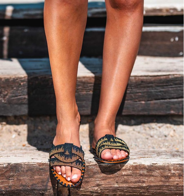 flat sandals  in orange and black beads cross straps. Vegan flats flat sandals  in orange and black beads cross straps. Vegan flats