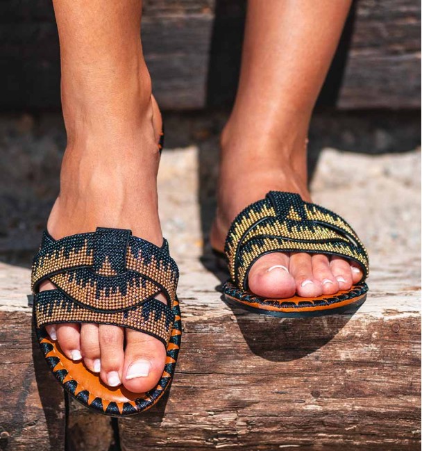flat sandals  in orange and black beads cross straps. Vegan flats flat sandals  in orange and black beads cross straps. Vegan flats