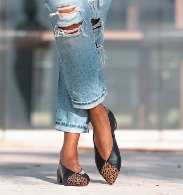 Women's shoes with low heel, made in black leather with leopard print toecap and heel. Animal free