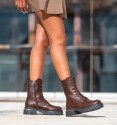 Women's brown military boots with laces and inner zip. Vegan leather