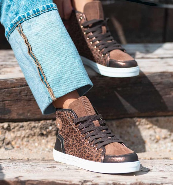 brown trainers with leopard print and white sole. Animal free