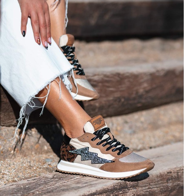 Women's trainers in combined materials with glitter stripes on the side and animal print heel.