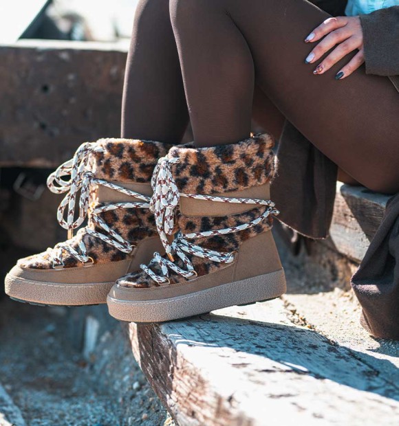 apres ski boots with leopard animal print sheepskin and climbing laces. Animal free