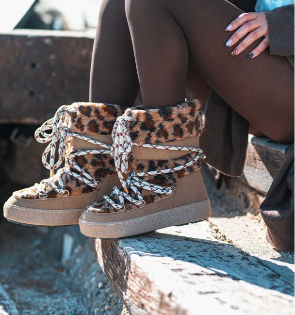 apres ski boots with leopard animal print sheepskin and climbing laces. Animal free