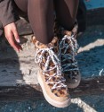 apres ski boots with leopard animal print sheepskin and climbing laces. Animal free