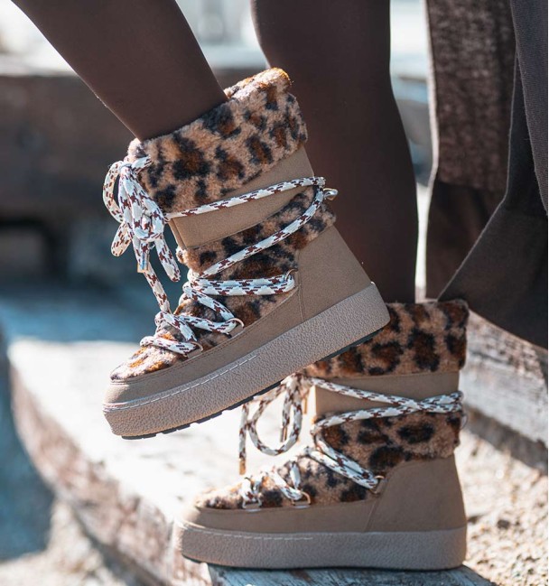apres ski boots with leopard animal print sheepskin and climbing laces. Animal free