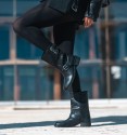 Black mid-calf boots with buckles. Inner zip and flat. Vegan