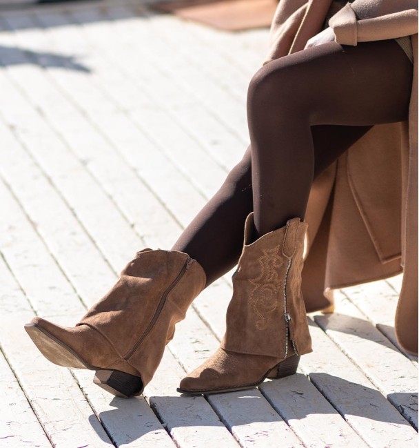 Camel half-calf boots with embroidered flap and external decorative zip and wood effect cube heel.