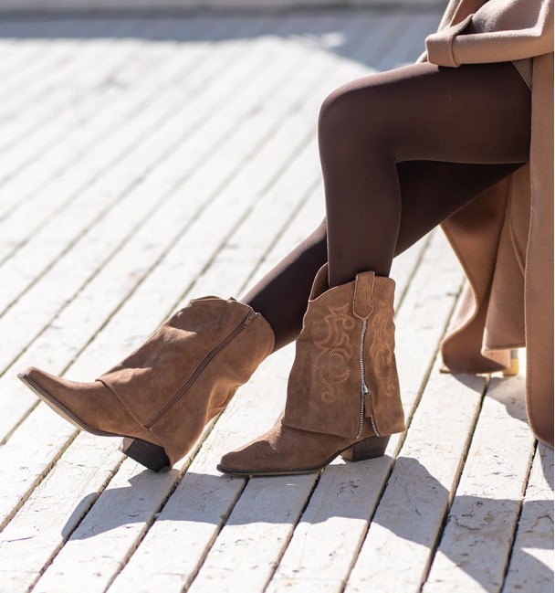 Camel half-calf boots with embroidered flap and external decorative zip and wood effect cube heel.