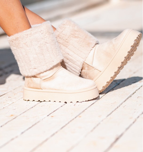 Beige winter boots in grey suede-like textile material, soft, beige synthetic fur upper. Beige winter boots in grey suede-like textile material, soft, beige synthetic fur upper.