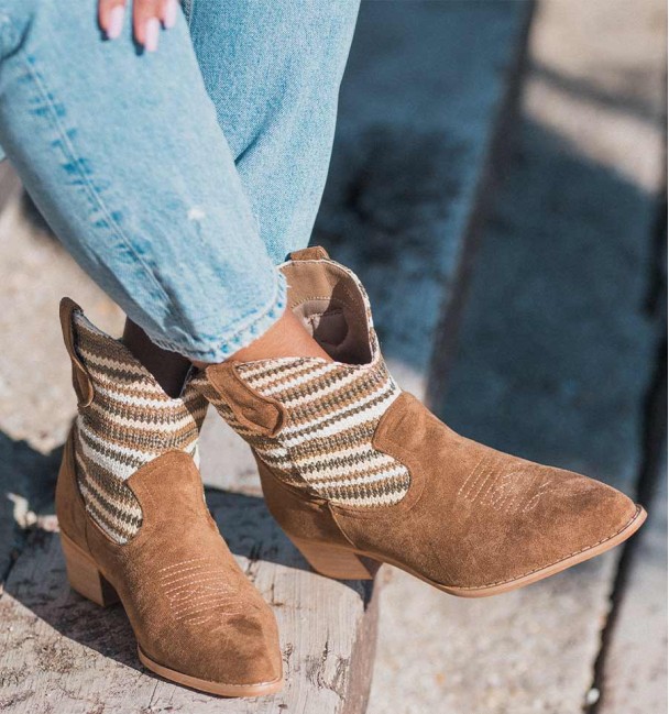 Beige cowboy boots with medium heels