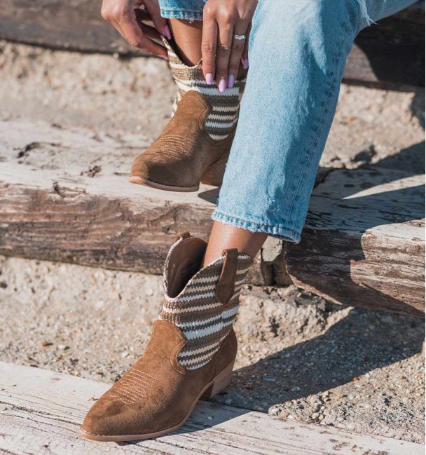 Beige cowboy boots with medium heels