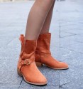 Orange country boots, half shaft with punching and zip. Low wood effect heel and golden buckle. Animal free.