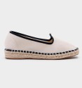 Beige and black espadrilles with yute soil.