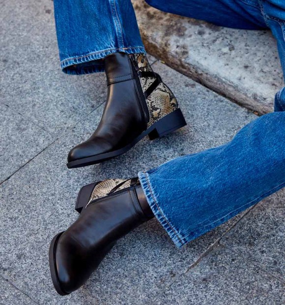 Black ankle boots with animal print
