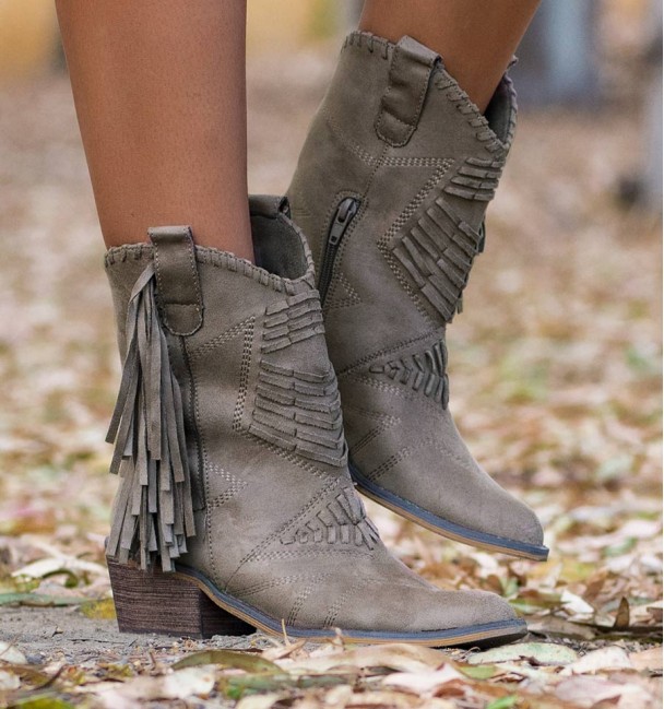 brown and fringed cowboy boots