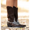 brown cowboy boot and snake with low heel